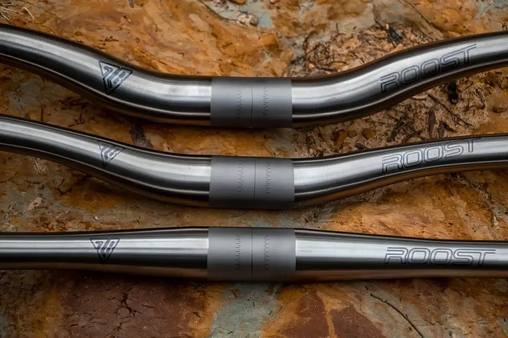Roost Titanium handlebar close up of clamp section and logos